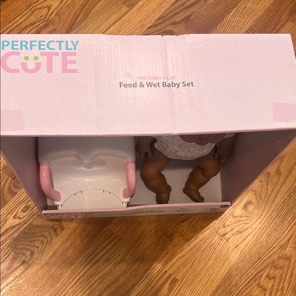 Perfectly Cute Brown Baby Doll Set with bottle toilet & color change diaper new - Picture 5 of 6